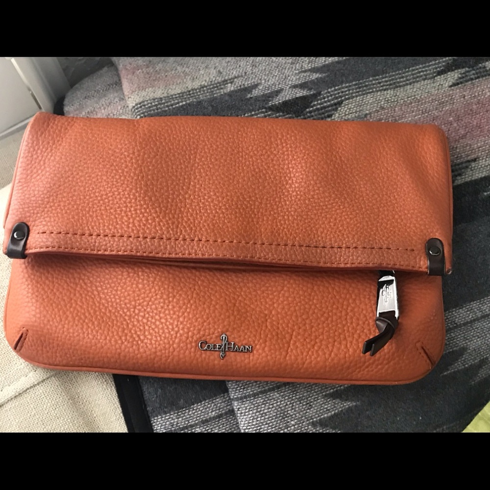 cole haan clutch in burnt orange